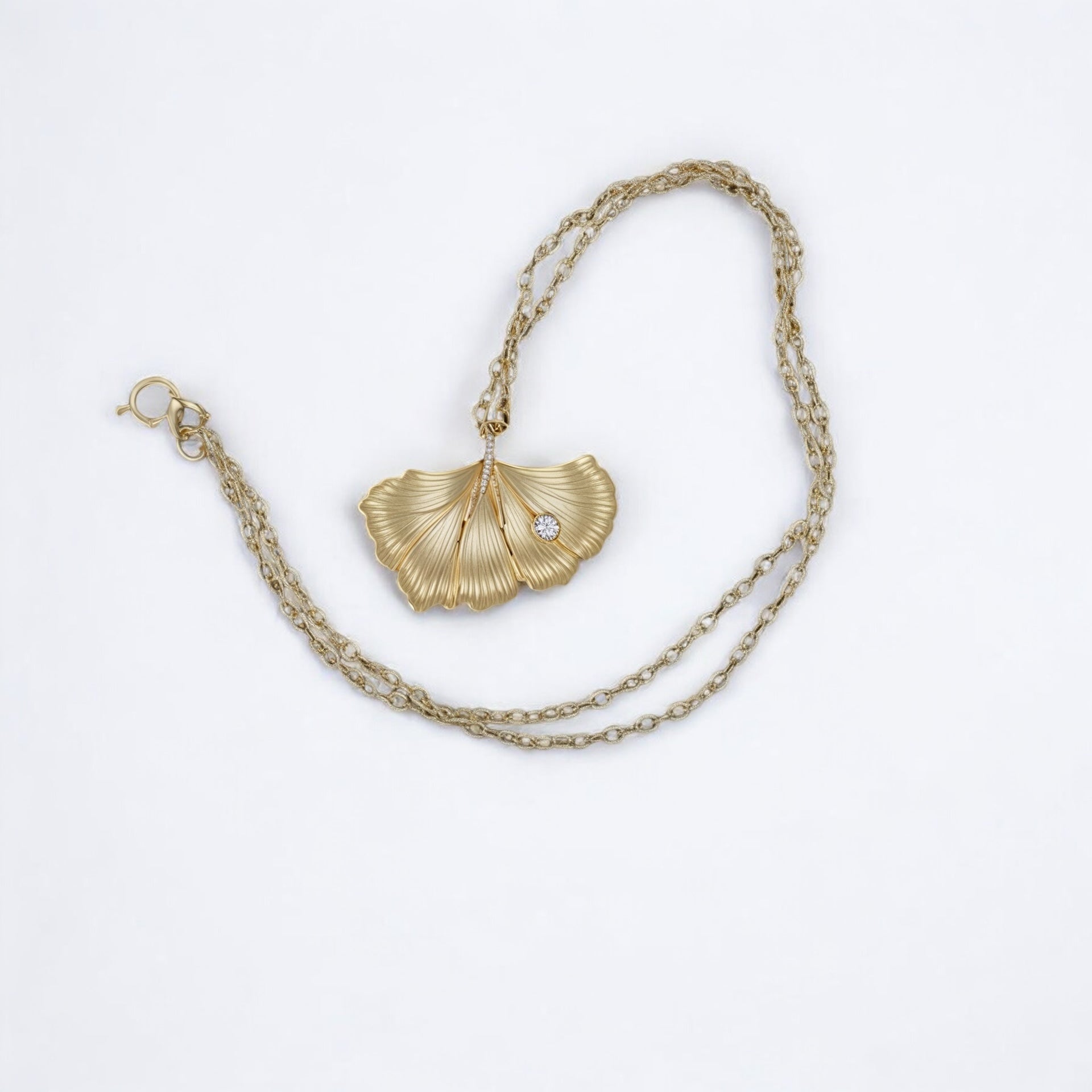 Artisan Hancrafted sustainable Bespoke  recycled Bronze Ginkgo leaf pendant with gold plated chain, handmade, Gift idea for Valentine’s Day, Christmas, birthday, anniversary